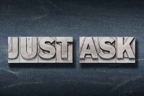 Metalic "Just Ask" on a blue jean-like fabric background