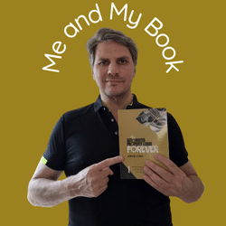 A picture of me (simon) holding a copy of my book (Automated Property Leads Forever).
