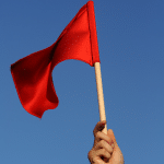 A red flag being waved.