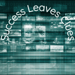 A futuristic representation of multiple screens monitoring compettors online with "Success Leaves Clues" banner in a half cirle curved text overlay.