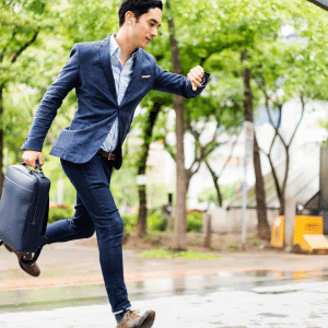 Man with not enough time rushing to a meeting.
