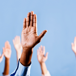 Several hands raised - all wanting to be picked.