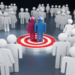 A crowd of white stick men and women with a target on the floor and a pink and blue stick woman and man standing in the centre. You've identified your audience - what now?