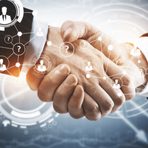 Closeup of 2 men shaking hands.
A network of people and unknown people you're yet to meet (symbolised with questionmarks) overlays the image.