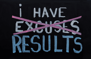 Chalked sign "i have excuses (corssed out) RESULTS".