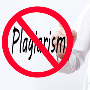 A hand drawing a stop sign over the word plagiarism.