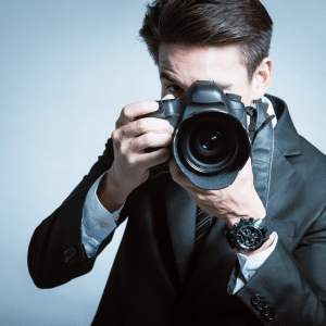 A photo of a professional photographer taking a photo.