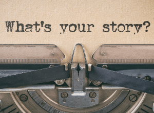 What's Your Story? - Typed on a sheet of paper in a typrewriter.