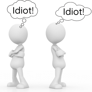 Misunderstanding - Idiots! - 2 stick men with their back to each other both thinking the other is an idiot.